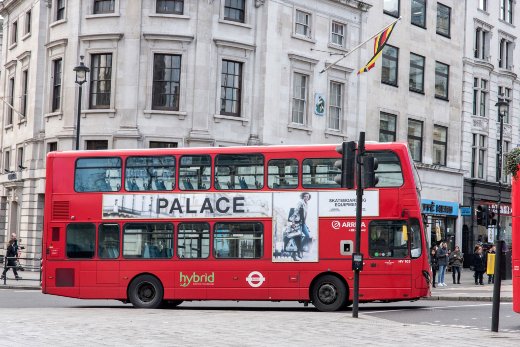 palace red bus ad london